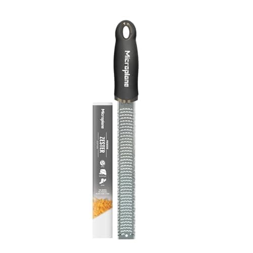 Microplane Premier Zester with a black handle and stainless grating surface.