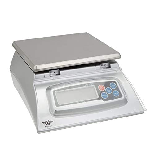 A silver My Weigh KD-8000 kitchen scale with a large square platform and baker's percentage buttons.