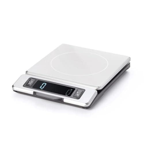 An OXO Good Grips stainless steel kitchen scale with its display pulled out from under the platform.